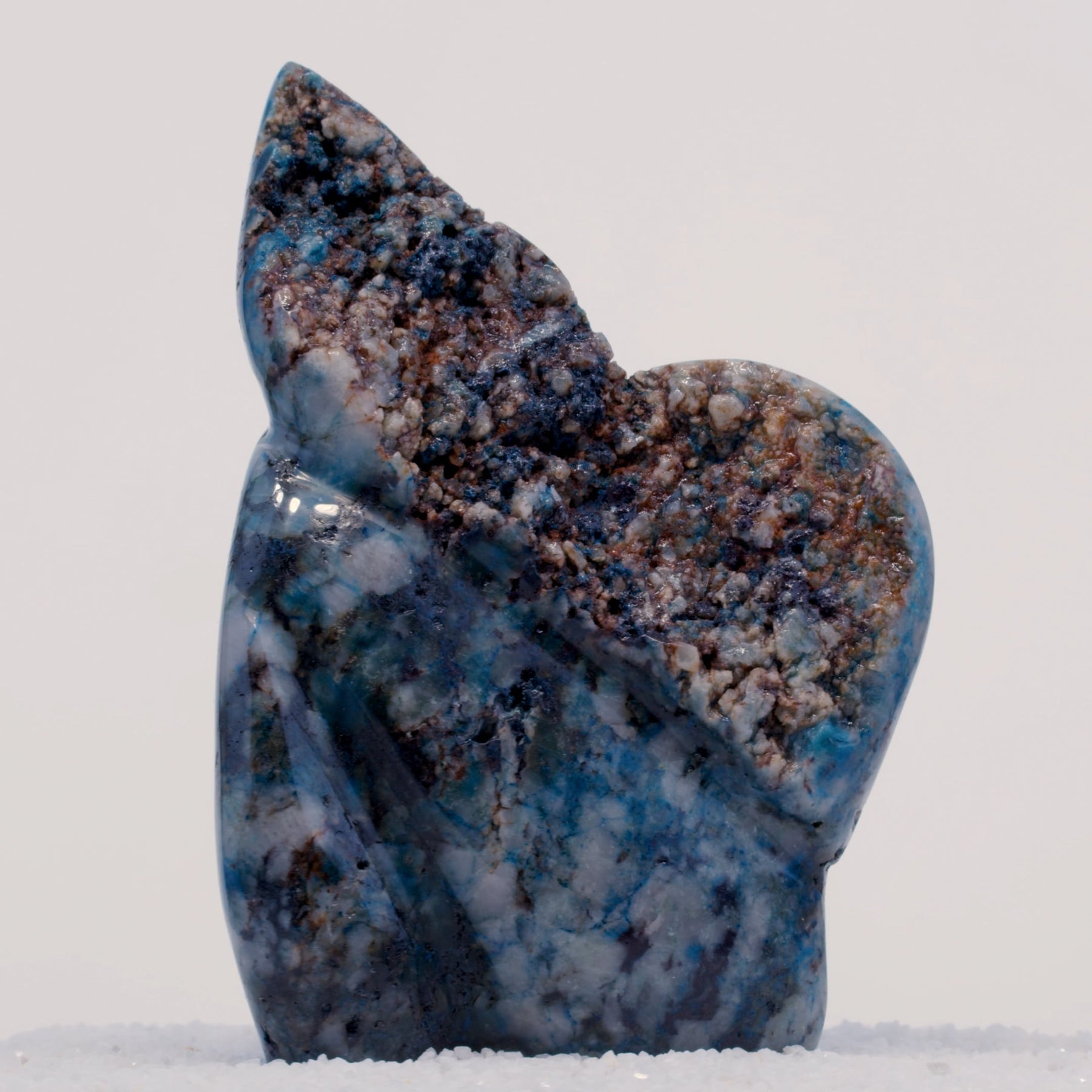 Dark blue Papagoite-bearing Canyonite sculpture showing preserved mineral zones